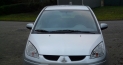 Volvo V70 2004 en Mitsubishi Colt 2007 004